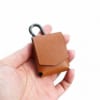 Bao da Fiil cc nano được làm từ da bò, màu nâu hạt khắc tên